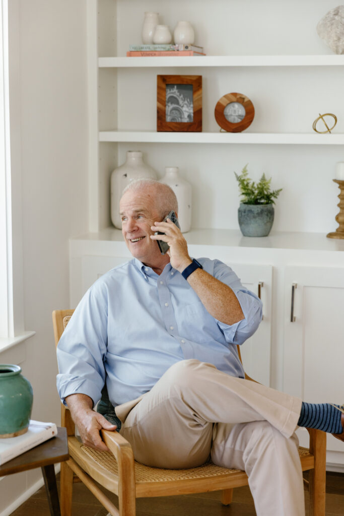 Bill on the phone discussing his resume.